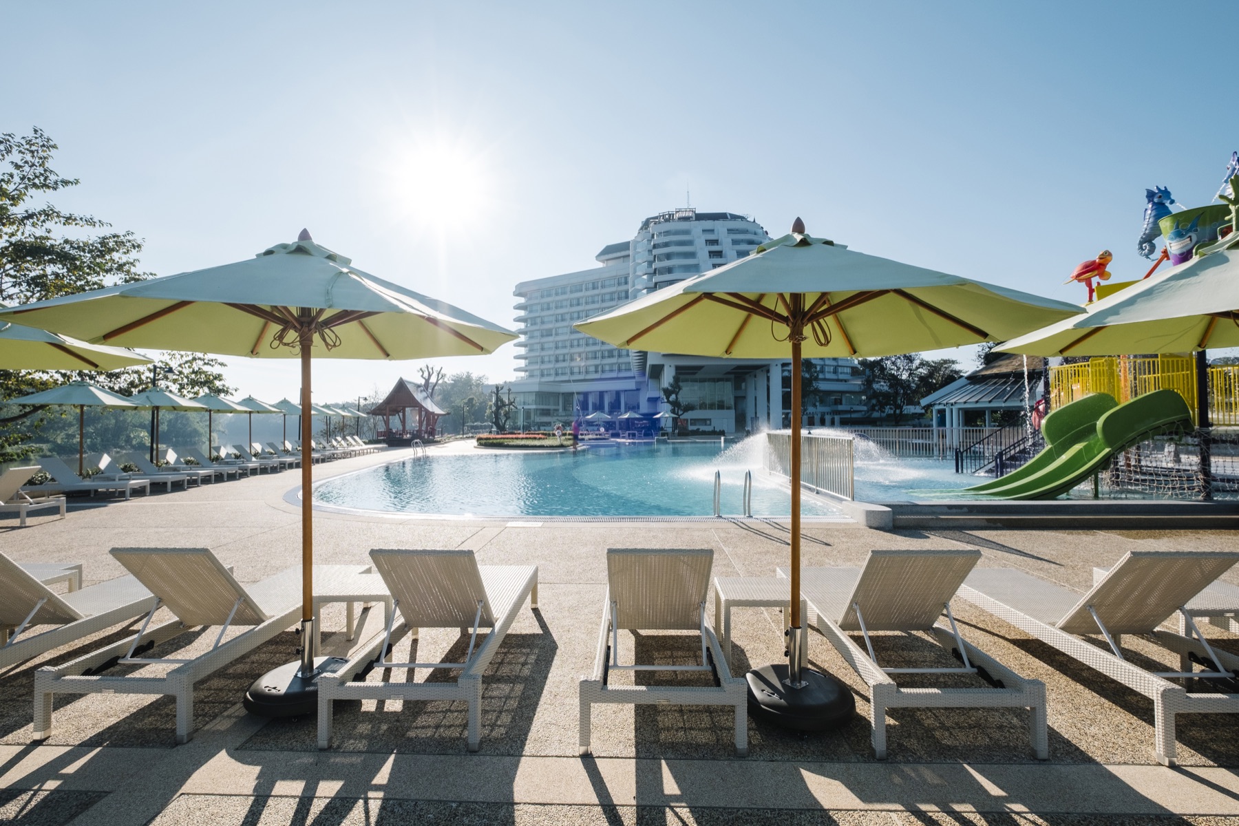 Hotel pool and sun loungers